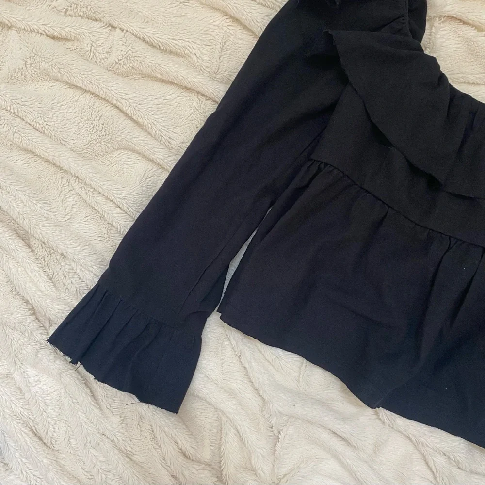 Free People Tulla babydoll open back long sleeve blouse black